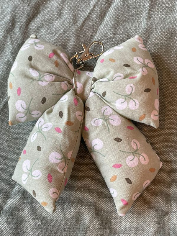 Fluffy bow tas hanger groen bladmotief